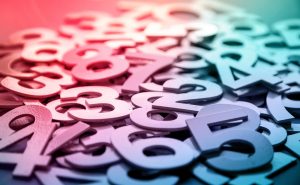 Mathematics,Abstract,Background,Made,With,Solid,Numbers,-,Closeup,View